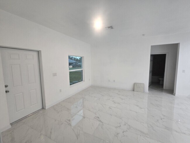 Building Photo - BRAND NEW THREE BEDROOM, 2 BATH, 1 CAR GAR...