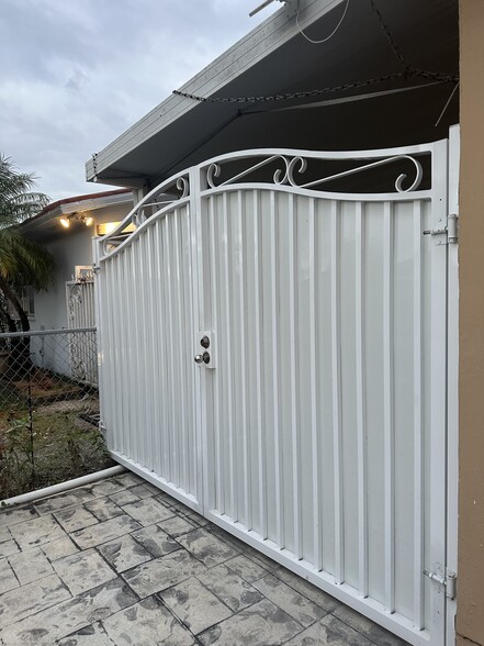 Gate outside of private entrance. - 11470 SW 5th Ter