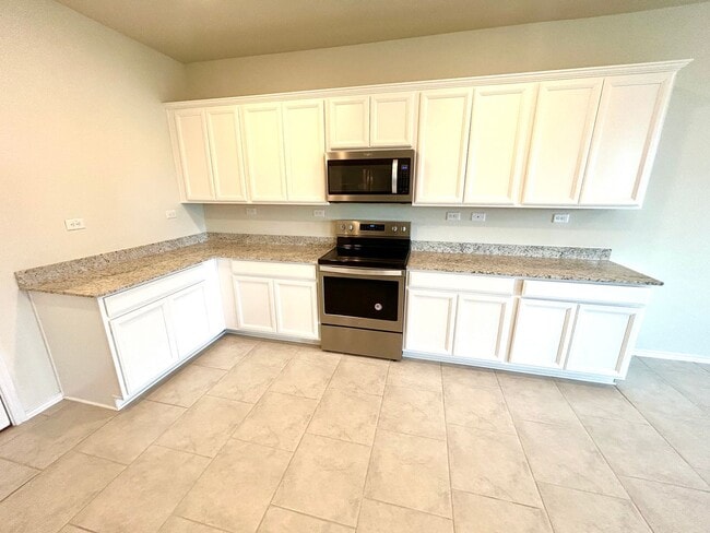 Building Photo - *COMING SOON* Sophisticated Two-Story Home with Versatile Loft Space!