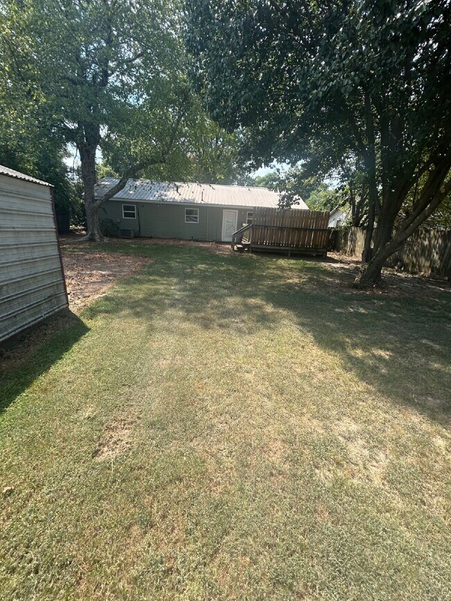 Building Photo - "Charming 4-Bedroom Retreat with Granite T...