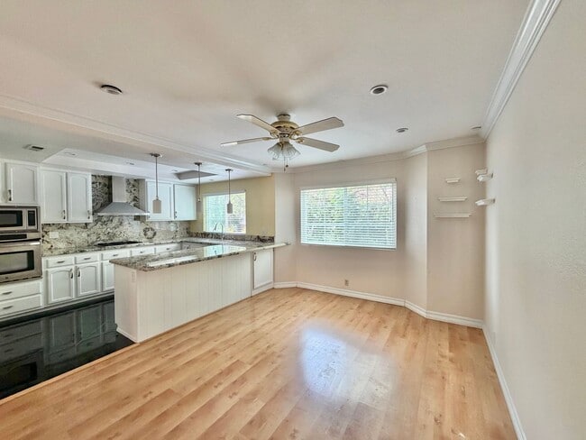 Building Photo - Tri-Level Townhome with attached 2 Car Garage