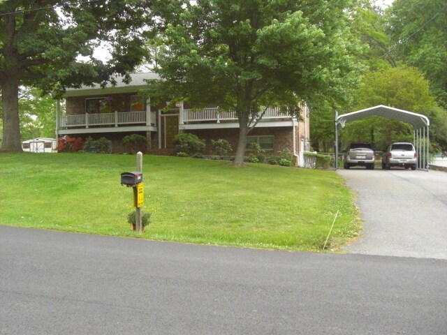 Front of House (Your Parking and Entry on Right Side) - 1016 Lakeview Dr