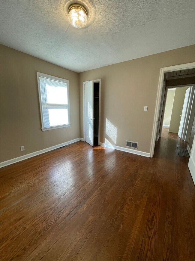 Building Photo - Coming Soon: 3BR Home with Bonus Space & Quick Highway Access