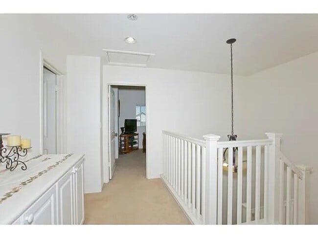 Building Photo - A stunning two-story house boasts three spacious bedrooms and 2.5 bathrooms