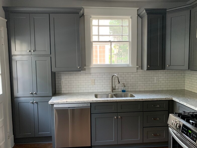 Updated kitchen with granite counters and stainless appliances - 1215 Foucher St