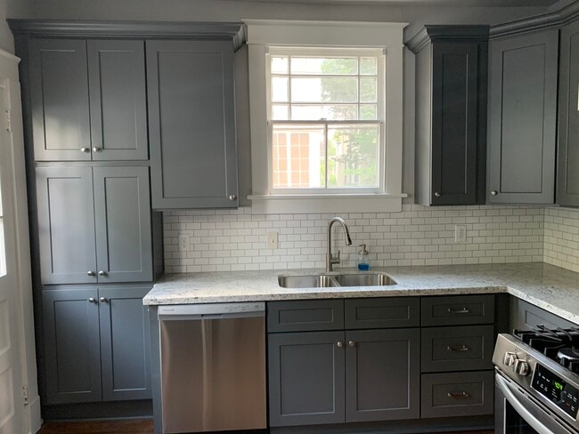 NEW kitchen with granite counters and stainless appliances - 1215 Foucher St