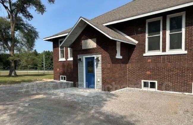 Building Photo - 7038 W Blanchard Rd