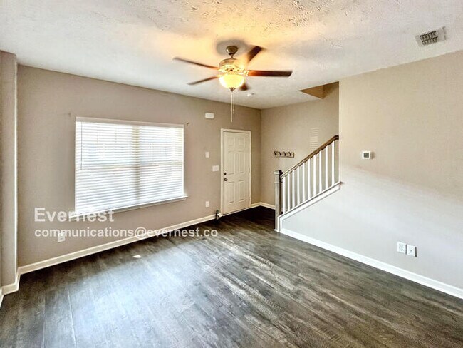 Building Photo - Charming 2BR Townhouse with Modern Comfort...