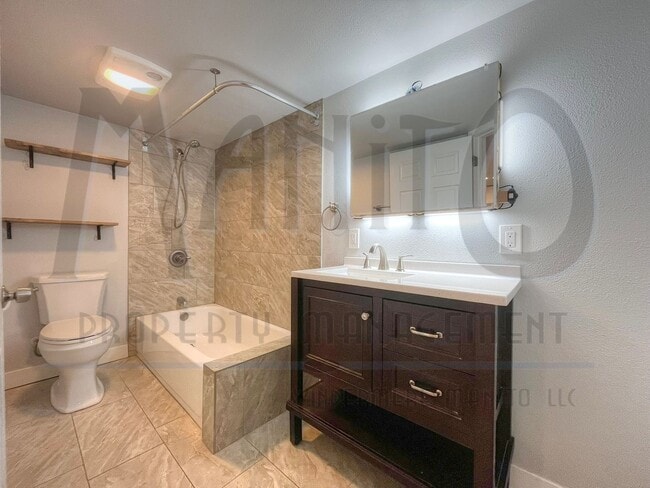 Building Photo - Garland Triplex