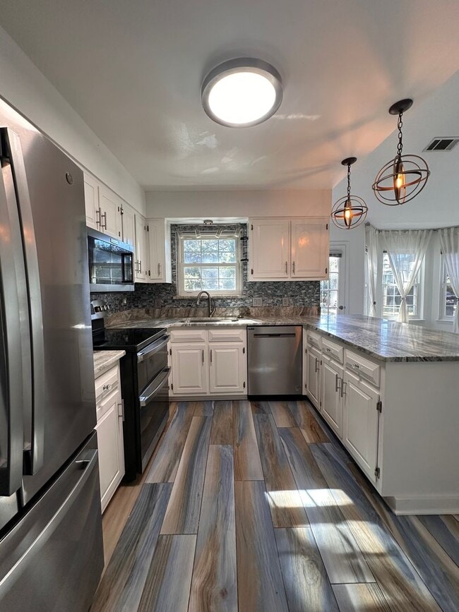 Building Photo - The BEST location there is-- Newly Renovated 3 bedroom home!