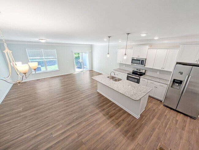 Building Photo - Spacious 3 Bed / 2.5 Bath Townhouse with Loft & 1-Car Garage