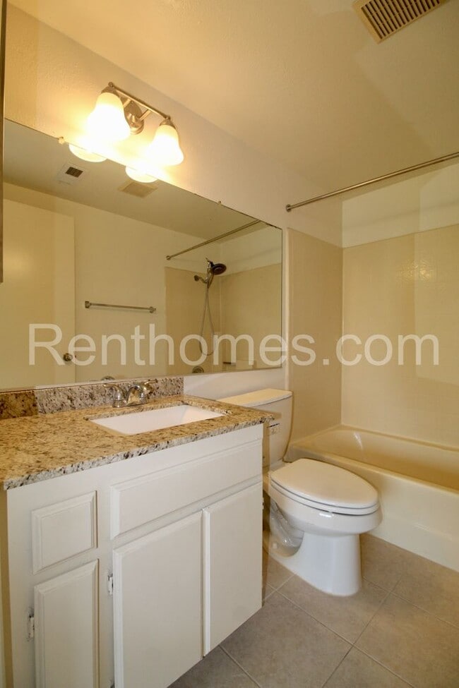 Building Photo - 9362 Twin Trails Dr