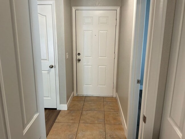 Building Photo - Condo 3 bedrooms 2 bathrooms 1 car garage gated subdivision.