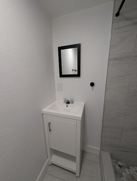 Building Photo - 1909 E 99th Ave