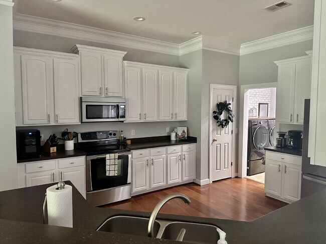 Building Photo - Beautiful 4-Bedroom Home in Desirable Baynard Park! | Hardwood Floors, Corian Countertops & Priva...