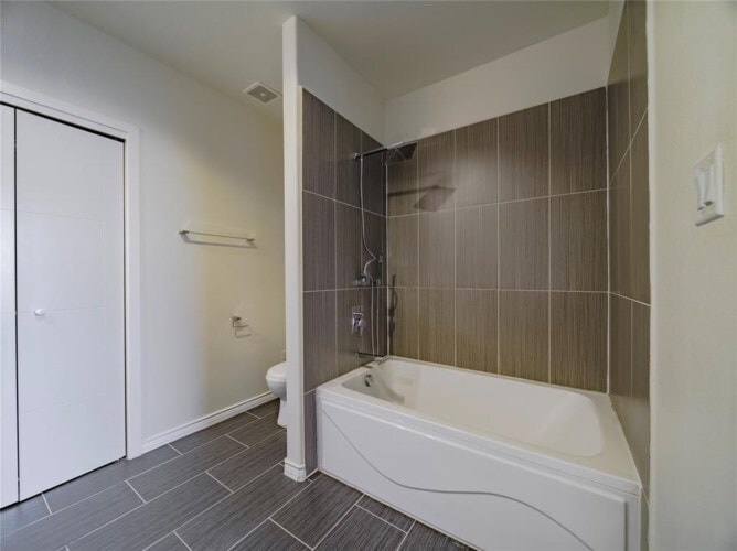 Building Photo - 1100 W Trinity Mills Rd