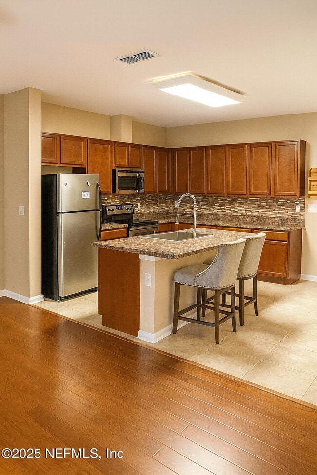 Building Photo - 4220 Plantation Oaks Blvd