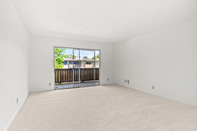 Building Photo - Modern 2-Bedroom Condo with Pool and Koi Pond Views