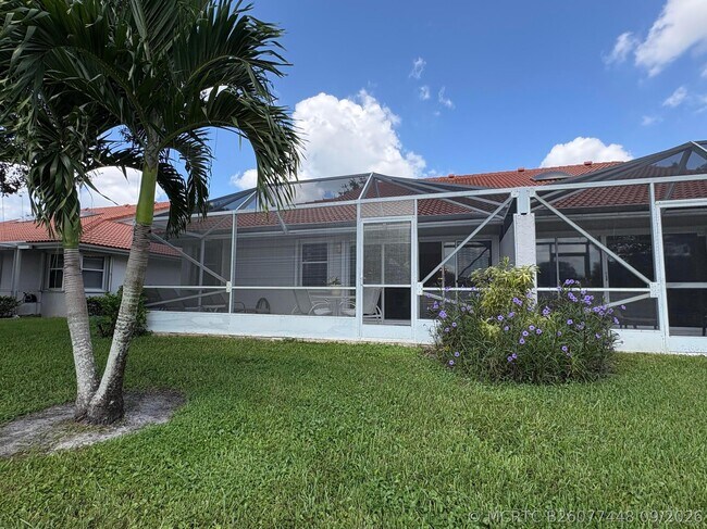Building Photo - 7702 Majestic Palm Dr