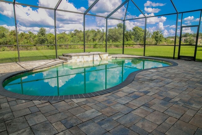 Building Photo - Elegant 5-Bedroom Pool Home with 3-Car Gar...