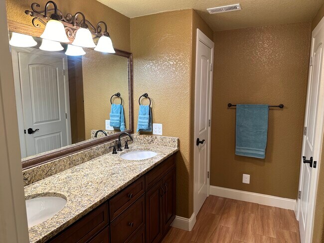 Bathroom with Double Vanity - 3813 Sky Hawk Ct