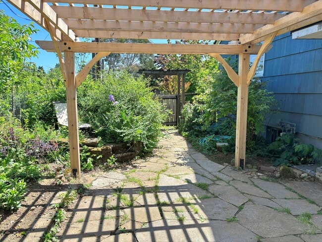 Building Photo - Spacious Montavilla Home on Corner Lot with Hardwoods, A/C, 1 Car Detached Garage, Finished Attic...