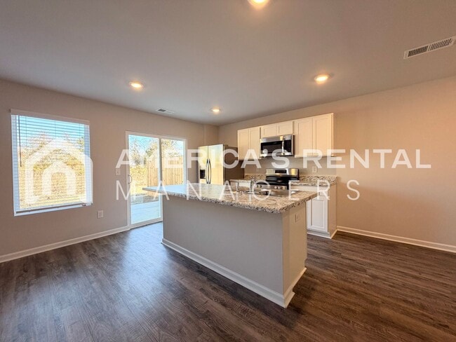 Building Photo - Spacious Two-Story Townhome with Open Layout!