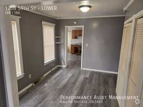 Building Photo - Charming 2-Bedroom Lower Unit Available 1/...