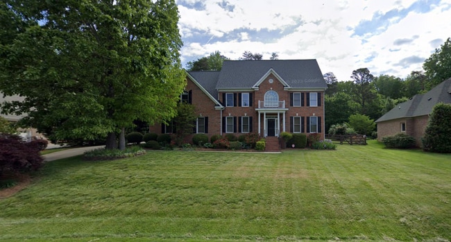 Building Photo - Spacious & Striking 3-story brick Executiv...