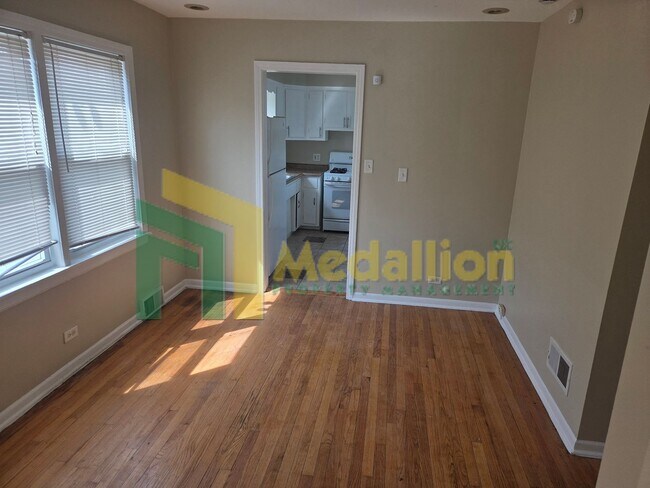 Building Photo - Spacious 4-Bedroom Home with Finished Basement and Yard Space