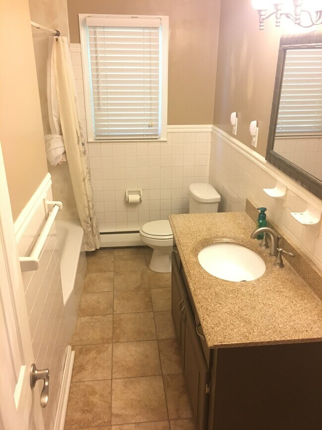 Building Photo - Welcome to this charming home in Chesapeak...
