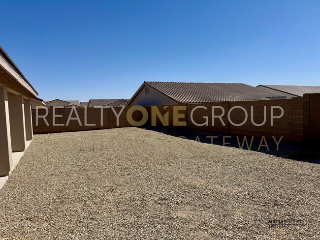 Building Photo - Enjoy those Arizona Sunset in this Three B...