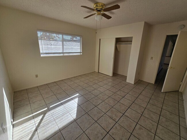 Building Photo - 1/2 Acre and All Tile!