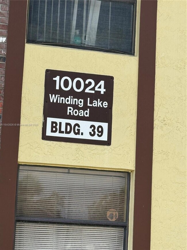 Building Photo - 10024 Winding Lake Rd