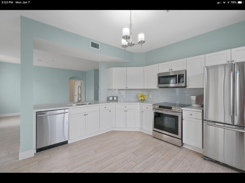 Kitchen with all stainless steel appliances - 11041 Legacy Blvd