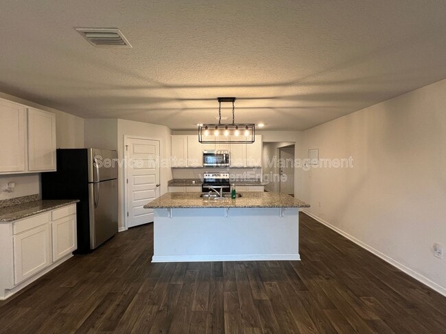 Building Photo - 5740 Guinevere Ln