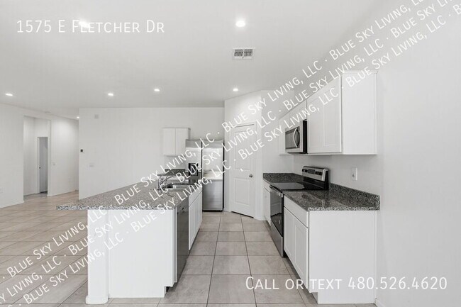 Building Photo - 1575 E Fletcher Dr
