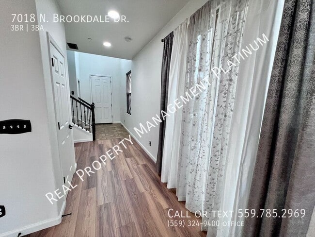 Building Photo - 7018 N Brookdale Dr