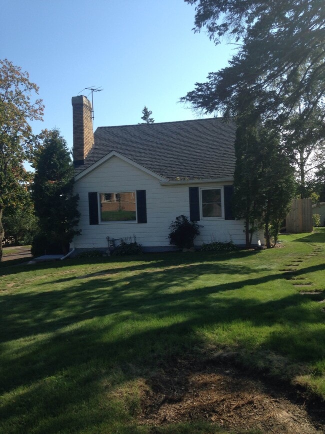 house front - 102 W College St