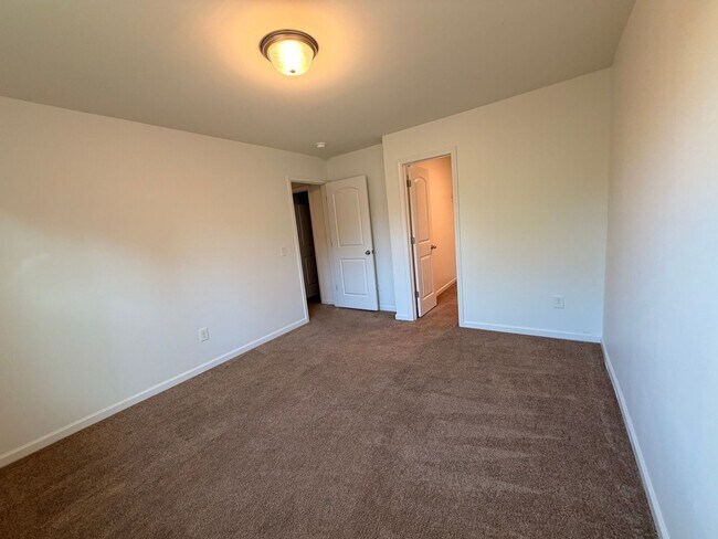 Building Photo - Available Now – Spacious 4BR Home on 1.5 Acres in Rural Hall!