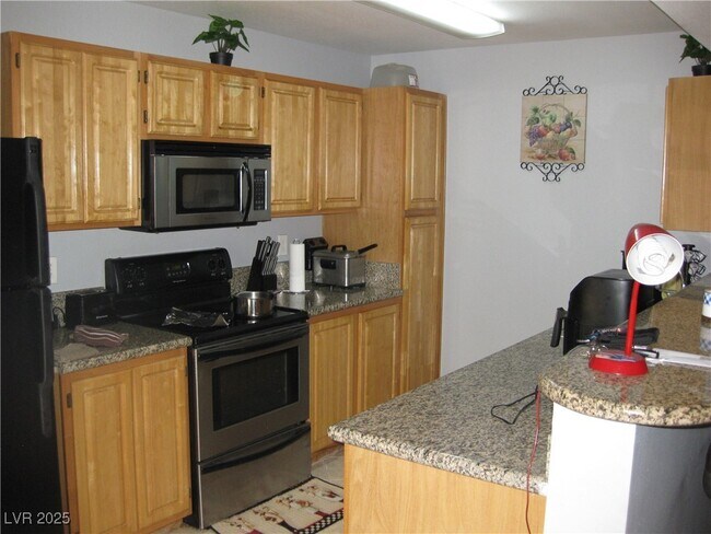 Building Photo - 5055 W Hacienda Ave