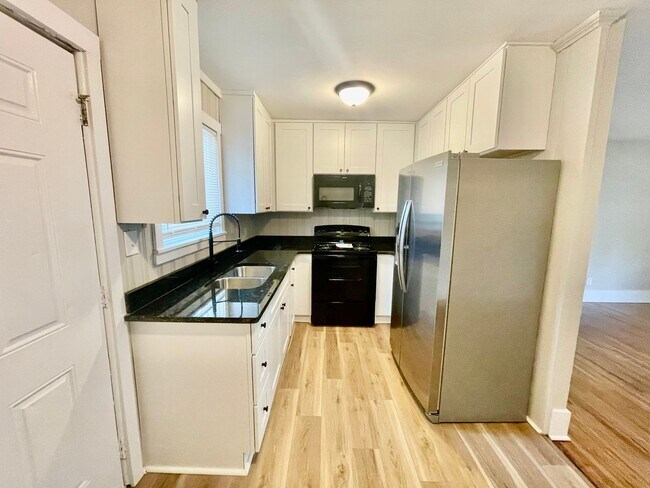 Building Photo - Welcome to Burgess2937, A Newly renovated ...