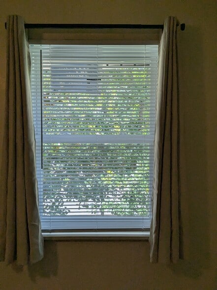 new windows and drapes - 566 Teal Ln