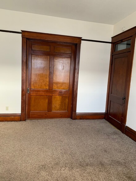 Huge sliding door separates front room from bedroom - 1518 7th Ave