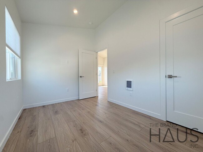 Building Photo - Brand-New 1-Bedroom, 1-Bathroom, 1-Compact Carport - Vaulted Ceilings in Belmont Heights