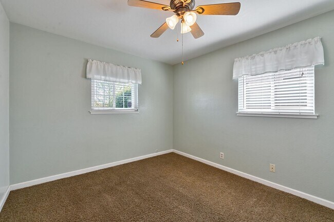 Building Photo - 3BR + Office Home in Excellent Condition with Storage Sheds and Garage Workspace!