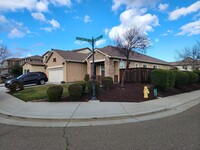 Building Photo - Beautiful Corner Lot with Large Yard, fron...