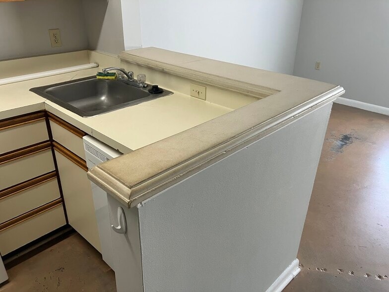 Concrete bar-height counter - 1600 Park Cir