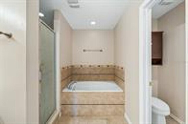 Building Photo - Luxury Lake Nona Townhome in Gated Community | 3BR + Garage + Resort-Style Amenities