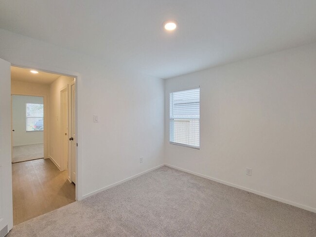 Building Photo - This lovely single-level home showcases a spacious open floorplan shared between the kitchen, din...